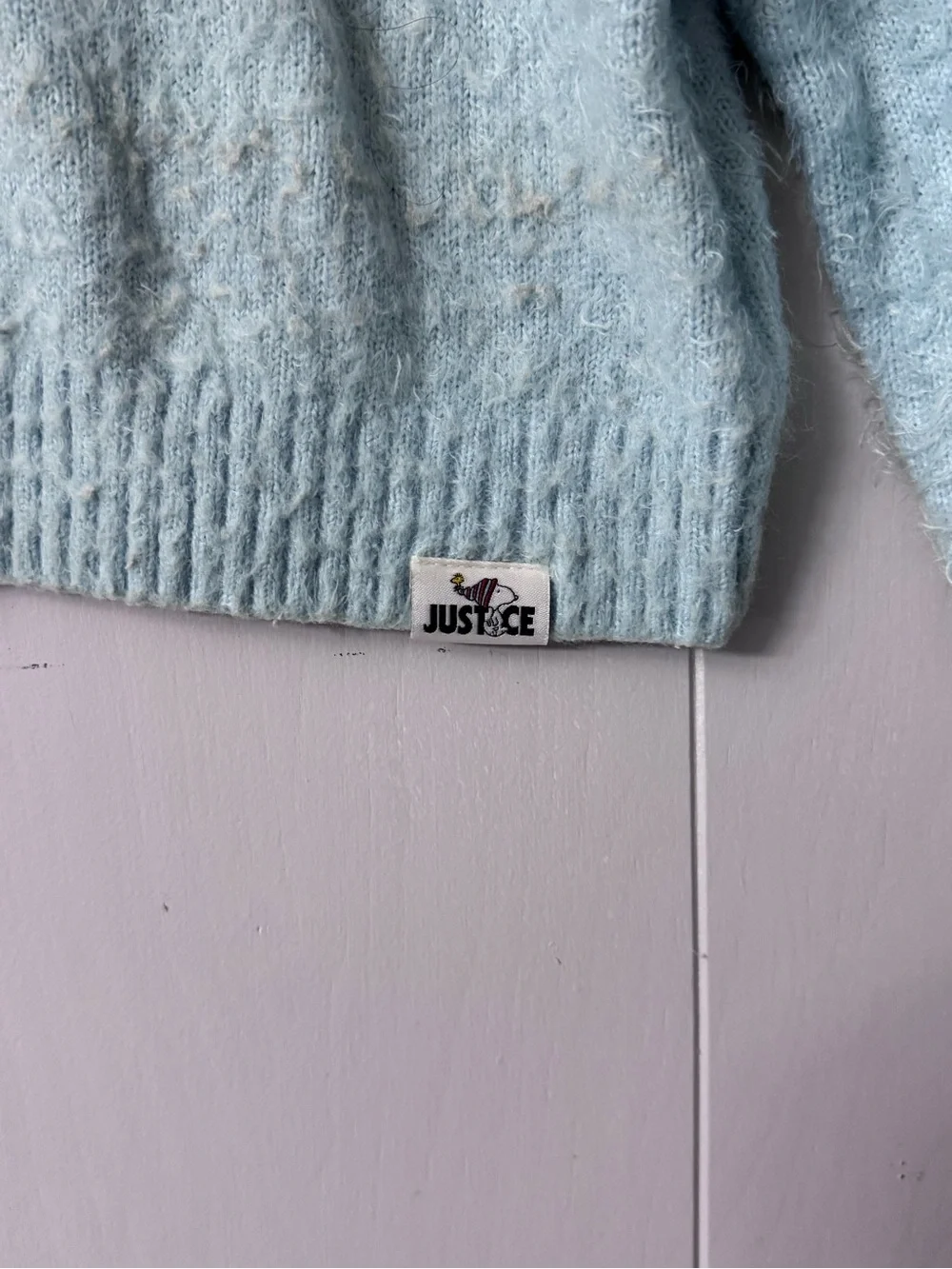 Justice Light Blue Fuzzy Cropped Sweater with Pink & Blue Graphic
